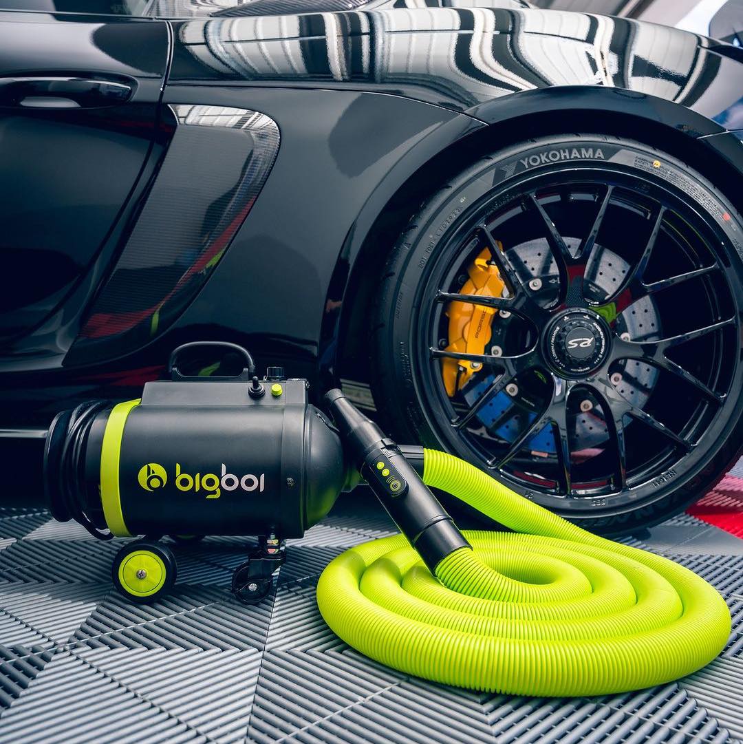 Twin Wash cleaning a car at home in Arabian Ranches 3 — hand wash, spot-free microfiber finish